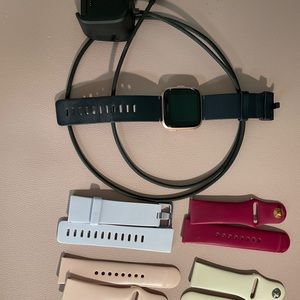 Fitbit Versa w/ charger & 5 bands